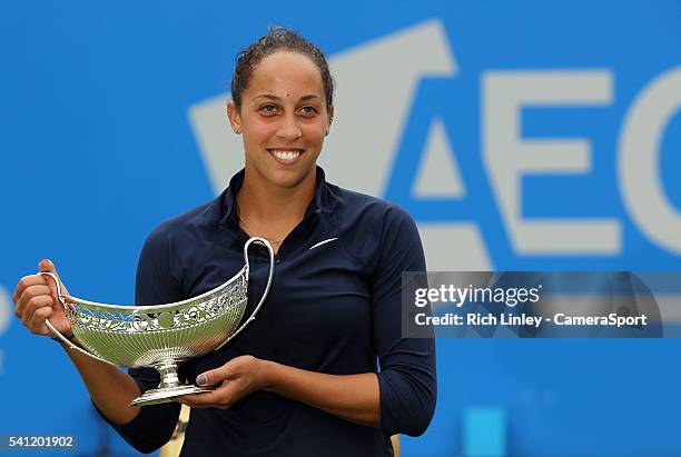 Madison Keys of USA holds the Maud Watson Trophy as she celebrates her victory over Barbora Strycova of Czech Republic in their Women's Singles Final...