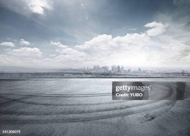 the future parking lot - skid marks stock pictures, royalty-free photos & images