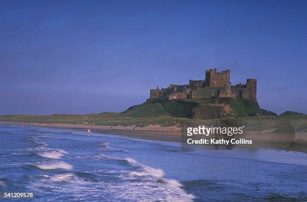 bamburgh castle on the northumbrian coast - bamburgh castle stock pictures, royalty-free photos & images