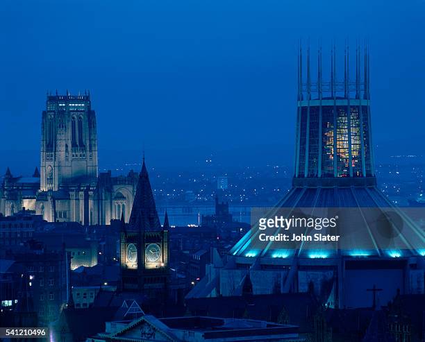 cathedrals of liverpool at night - liverpool cathedral stock pictures, royalty-free photos & images