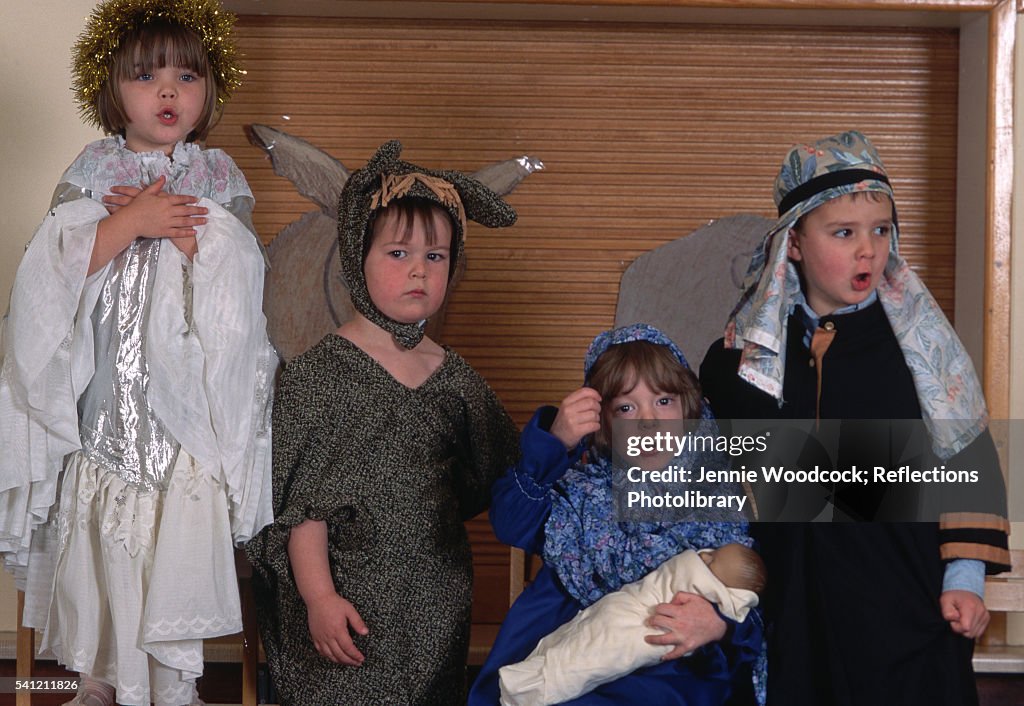 Nativity Roles Costumed Children Performing A Nativity Play At School High-Res Stock ...