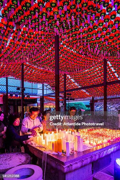 gangnam, bongeunsa temple, devotees during the lotus lantern festival - gangnam festival stock-fotos und bilder