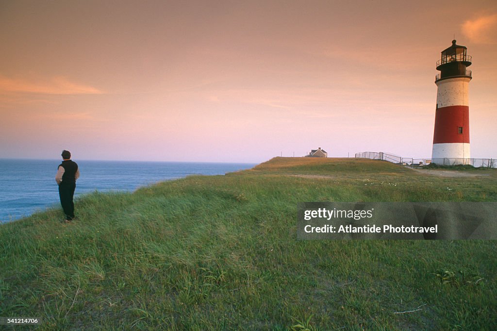 Man Enjoying View of Ocean at Sankaty Lighthouse