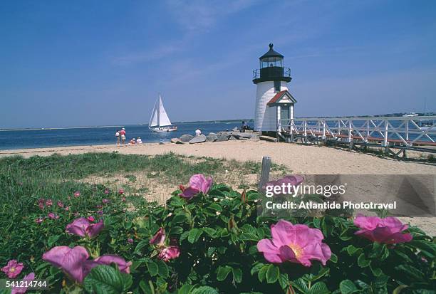 brant point lighthouse - massachusetts beach stock pictures, royalty-free photos & images