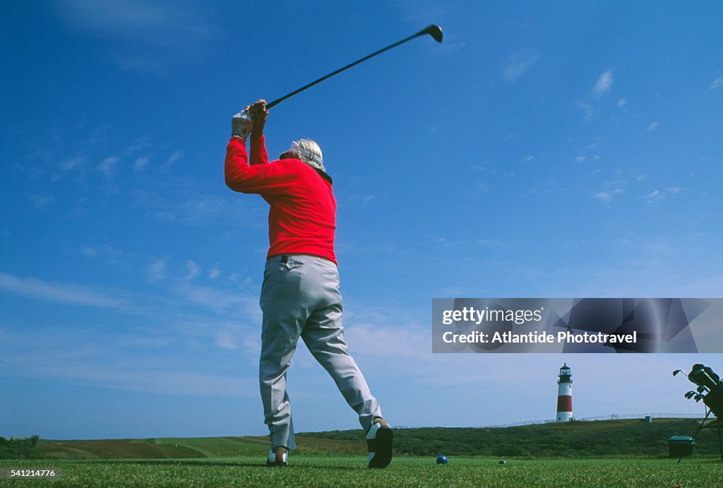 Golfer Teeing Off on Course near Sankaty Head Lighthouse