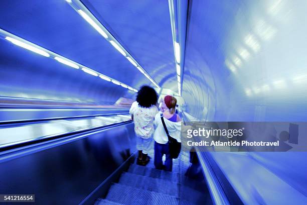 escalator at salvator rosa metro station - southern european descent stock-fotos und bilder