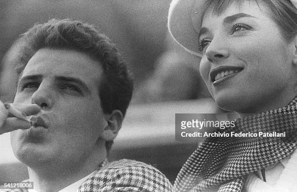 Italian Actress Elsa Martinelli with Count Mancinelli Scotti at a football match.