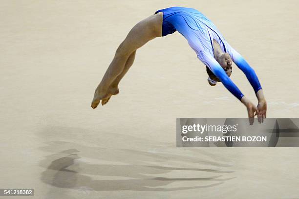 French gymnast Juliette Bossu competes on the floor during the French Artistic Gymnastics Championships in Mulhouse on June 19, 2016. / AFP /...
