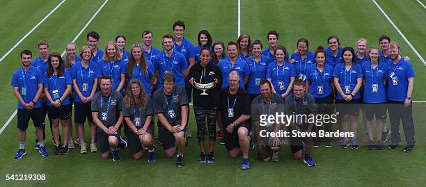 Madison Keys of United States poses with the Maud Watson trophy and the ground staff on day seven of the WTA Aegon Classic at Edgbaston Priory Club...