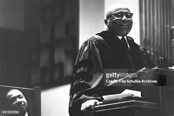 Reverend Martin Luther King Jr. Listens to his father Martin Luther King Sr., sermon at Ebenezer Baptist Church.
