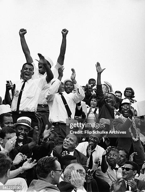 Marchers cheer after civil rights leader Martin Luther King Jr.'s famous "I Have a Dream" speech at the conclusion of the March on Washington on...