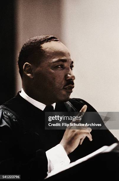 Reverend Martin Luther King Jr. Stands for a portrait at the pulpit in Ebenezer Baptist Church.