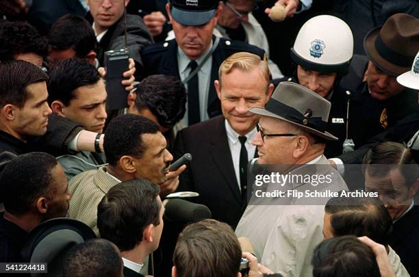 Reporters surround civil rights leader Reverend C.T. Vivian and Director of Public Safety Wilson Baker before march from Selma.