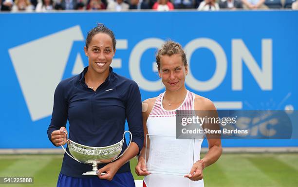 Madison Keys of United States with the Maud Watson trophy and Barbara Strycova of Czech Republic after the Women's Singles Final on day seven of the...