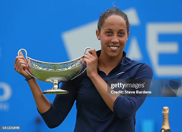 Madison Keys of United States celebrates with the Maud Watson trophy after her victory in the Women's Singles Final on day seven of the WTA Aegon...