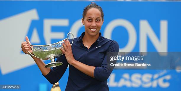 Madison Keys of United States celebrates with the Maud Watson trophy after her victory in the Women's Singles Final on day seven of the WTA Aegon...