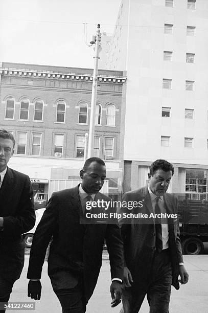 James Meredith, the first black student admitted to the University of Mississippi, accompanied by U.S. Marshal James J.P. McShane and Justice...