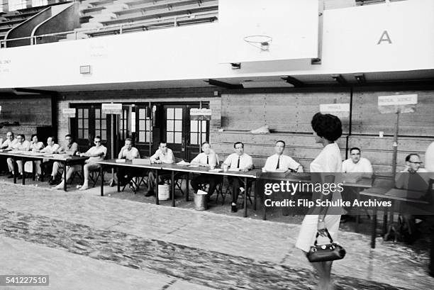 Vivian Malone registers for her classes at the University of Alabama. Governor George Wallace famously blocked the doors of the registration center...