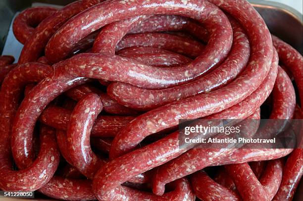 freshly made sausage - insaccato foto e immagini stock