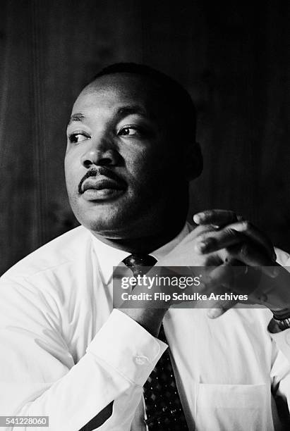 Martin Luther King Jr. Listens at a meeting of the SCLC, the Southern Christian Leadership Conference, at a restaurant in Atlanta. The SCLC is a...