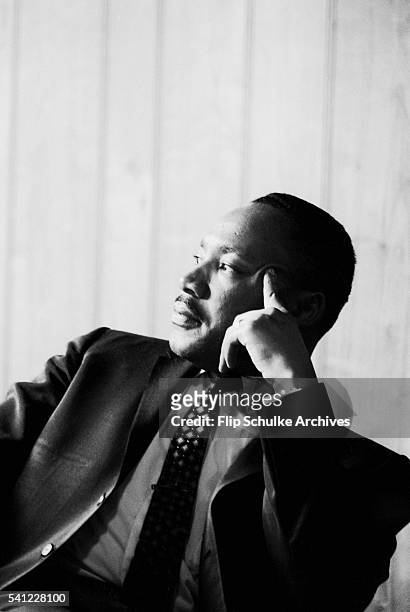 Civil rights leader Martin Luther King Jr. Listens at a meeting of the SCLC staff at an Atlanta restaurant.