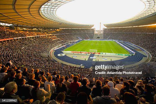 soccer game at olympic stadium - olympic stadium berlin stock pictures, royalty-free photos & images