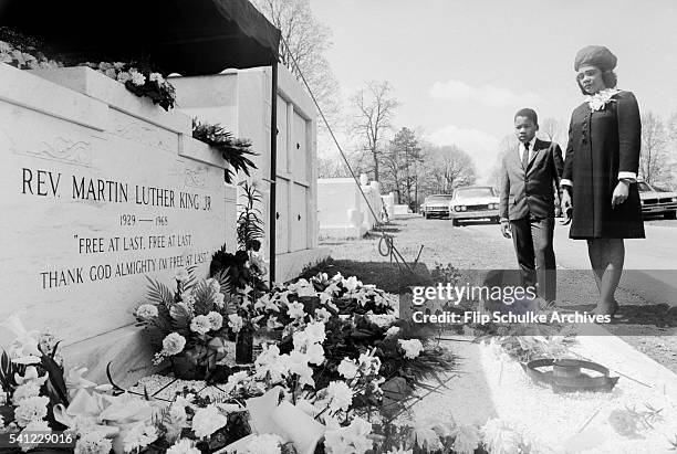 Coretta Scott King and her son Dexter visit the grave of Martin Luther King Jr. One year after his assassination.