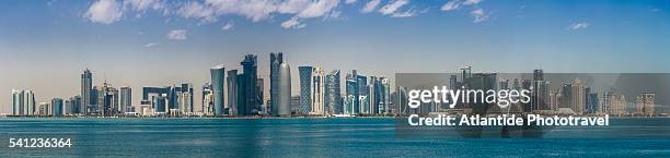 view of al dafna district (west bay business quarter) from museum of islamic art (mia) park - doha skyline stock-fotos und bilder