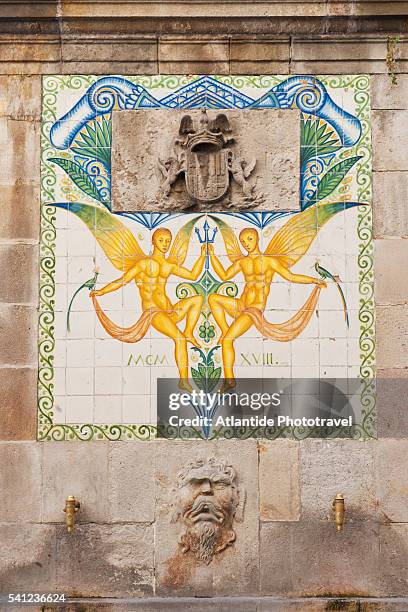 fountain with azulejos at avenida portal del angel - portal del angel stock pictures, royalty-free photos & images