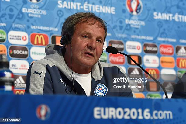 In this handout image provided by UEFA, Slovakia Head Coach Jan Kozak faces the media during the Slovakia Press Conference on June 19, 2016 in...