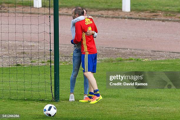 Andres Iniesta of Spain embraces his wife Anna Ortiz after a training session at Complexe Sportif Marcel Gaillard on June 19, 2016 in La Rochelle,...