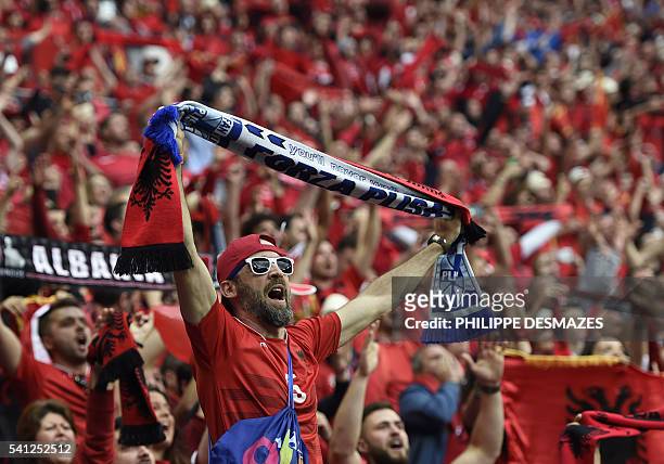 Albania supporters are pictured ahead the Euro 2016 group A football match between Romania and Albania at the Parc Olympique Lyonnais stadium in Lyon...