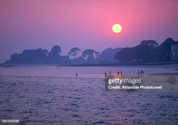 sunset near village on st. simons island - st simons island stock pictures, royalty-free photos & images