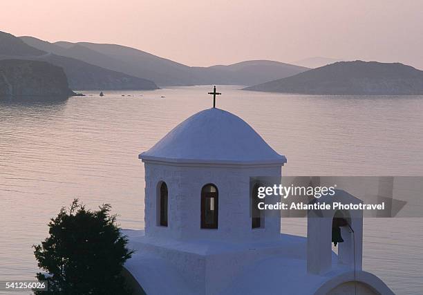 church on northeast coast of patmos - ägäisches meer stock-fotos und bilder