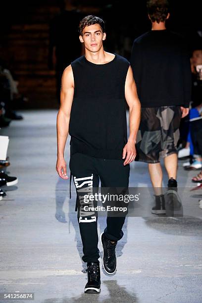 Model walks the runway at the Ports 1961 designed by Milan Vukmirovic show during Milan Men's Fashion Week Spring/Summer 2017 on June 17, 2016 in...