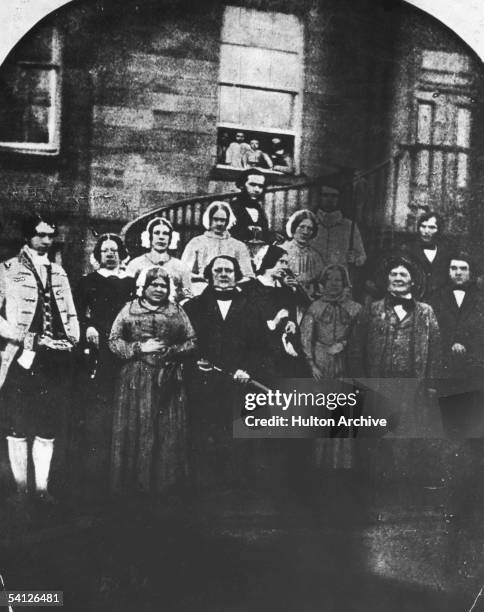 The domestic staff at Erdigg Hall, the home of the Yorke family in Wrexham, North Wales, 1852. They are head gardener James Phillips, coachman Edward...