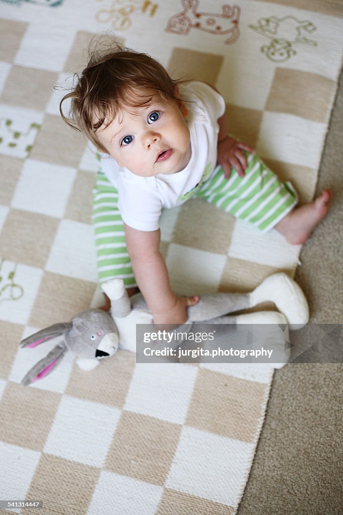 Baby sitting on the floor