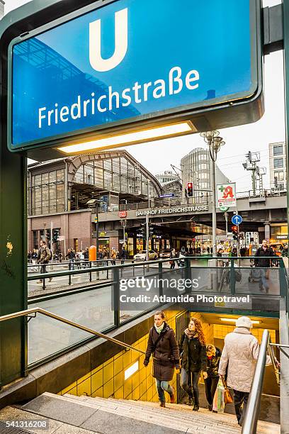 friedrichstrasse, the entrance of the u-bahn (underground railway), on the background the bahnhof (railway station) friedrichstrasse - ubahn station bildbanksfoton och bilder