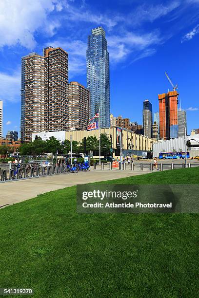 hell's kitchen - pier 84 on the hudson river with kayaks near the intrepid air sea and space museum - pier 84 stock pictures, royalty-free photos & images