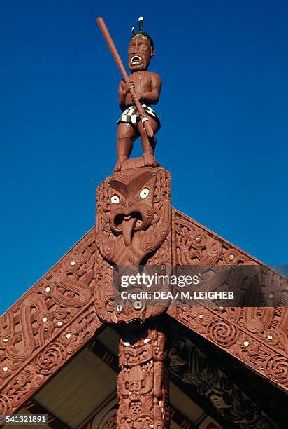 Maori warrior, wooden carving, Maori Meeting House, Ohinemutu village, Waitangi, Bay of Islands, New Zealand.