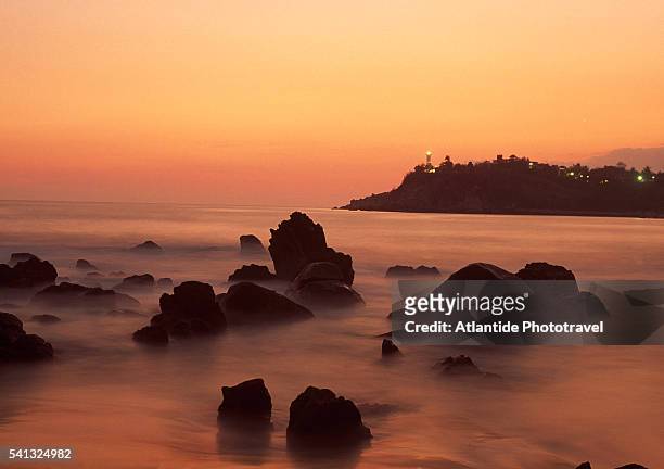 sunset in puerto escondido - puerto escondido stock pictures, royalty-free photos & images