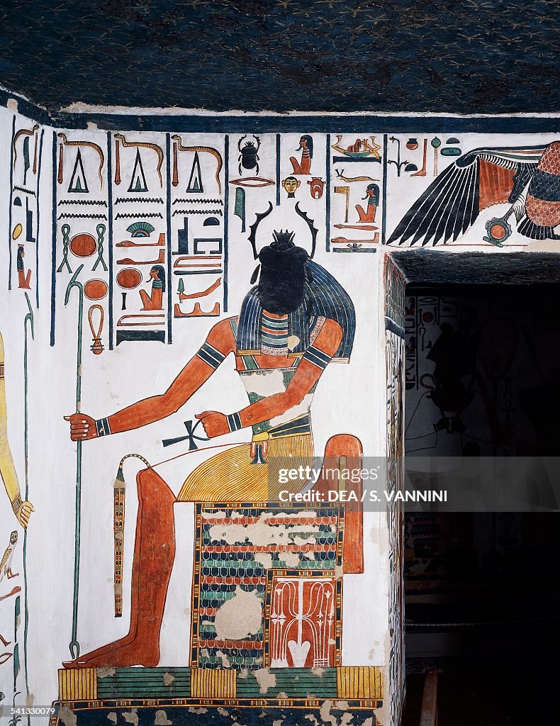 The God Khepri, scarab-headed man...