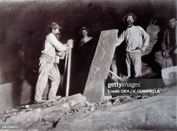 Quarrymen in a slate quarry, photograph from 1930s, Liguria, Italy. Cicagna, Museo Dell'Ardesia