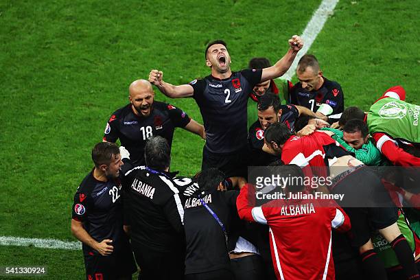 Andi Lila of Albania celebrates his team's first goal scored by Armando Sadiku during the UEFA EURO 2016 Group A match between Romania and Albania at...