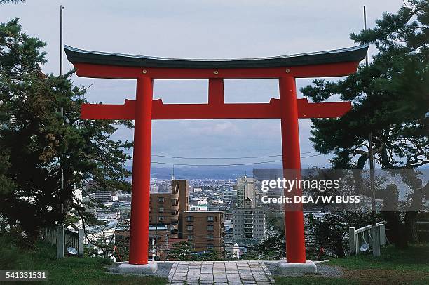 Torii, entrance to the Gokoku-jinja Shinto Shrine, Hakodate, Hokkaido, Japan.