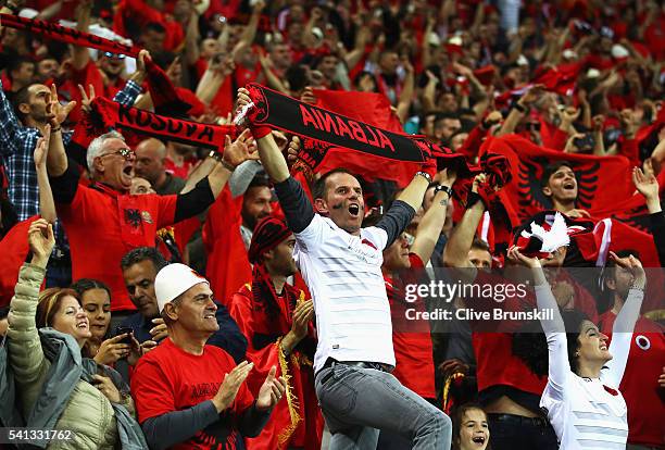 Albania supporters celebrate their team's first goal during the UEFA EURO 2016 Group A match between Romania and Albania at Stade des Lumieres on...