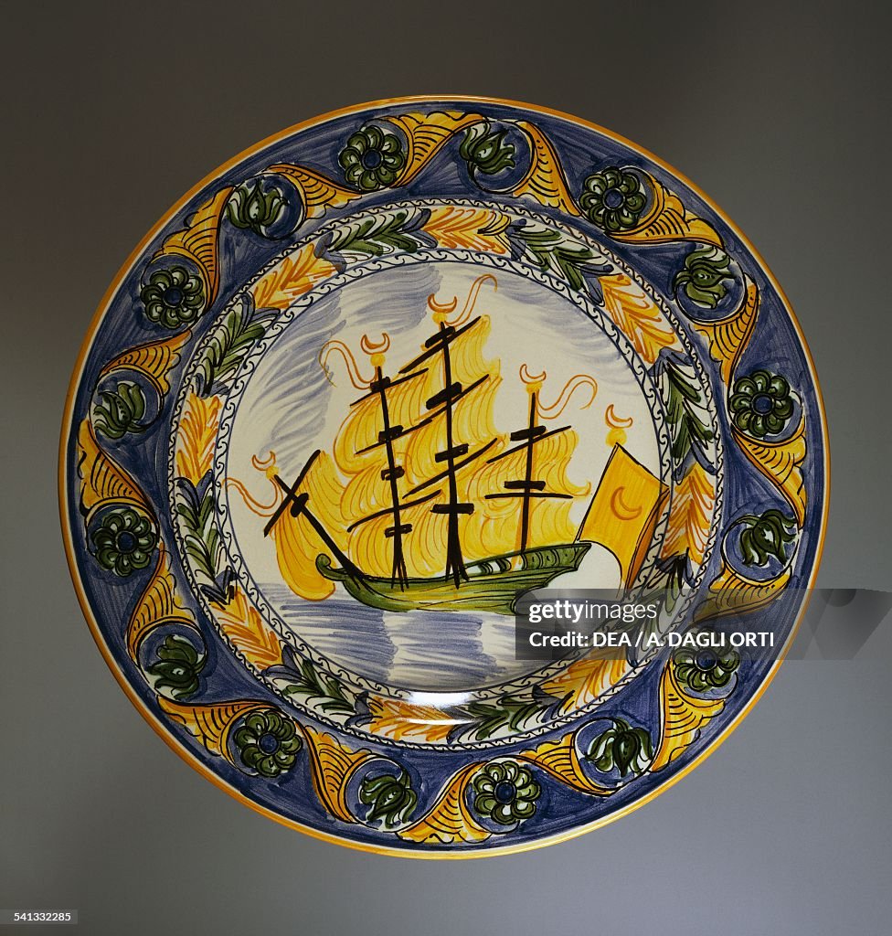 Decorative plate depicting a boat...