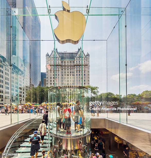 manhattan, midtown, apple store near the fifth (5th) avenue - apple store new york stock pictures, royalty-free photos & images