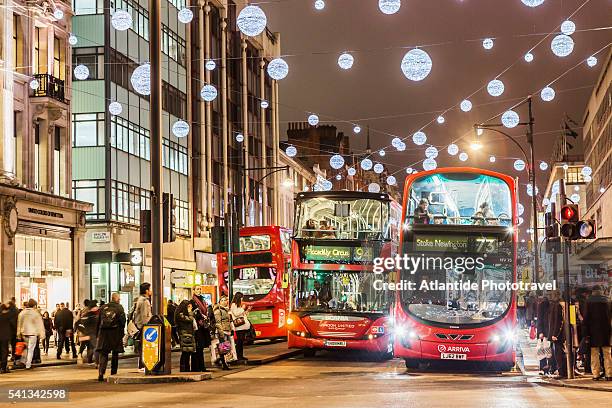 typical busses in oxford street during the christmas period - oxford street imagens e fotografias de stock