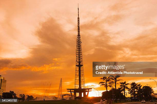 the brasilia tv tower at sunset - brasília stock pictures, royalty-free photos & images
